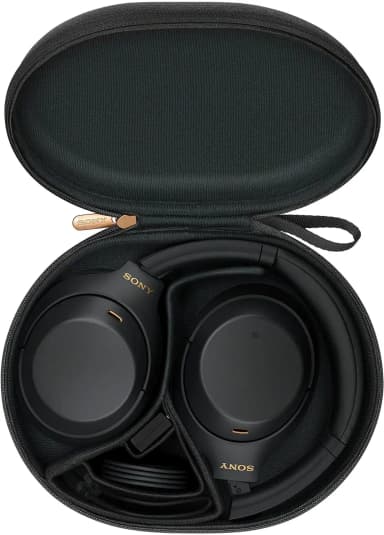Sony WH-1000XM4 headphones in the box, accessories included, glasses-friendly.