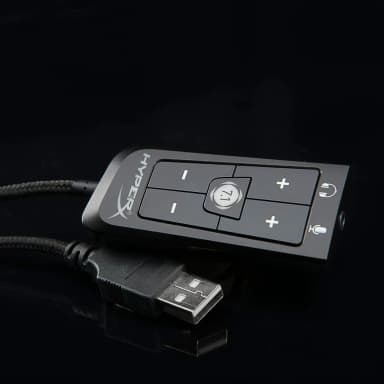Close-up of HyperX Cloud 2 USB sound card with 7.1 virtual surround sound control buttons.