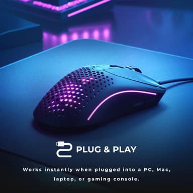 Glorious Model O 2 mouse on a desk with purple lighting